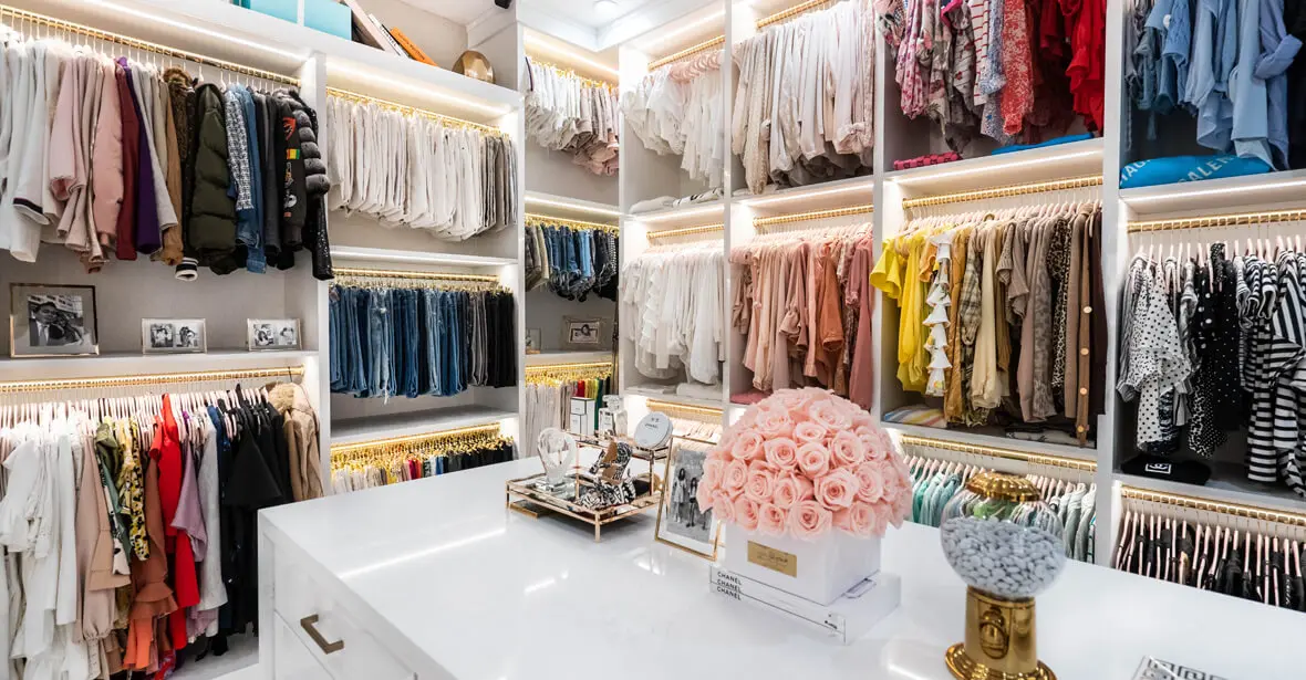Custom closet with glass display doors